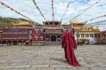 Lama,Going,Towards,The,Temple